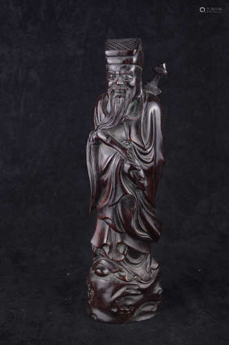 A TAOIST LV HE IMMORTAL SHAPED WOOD CARVING