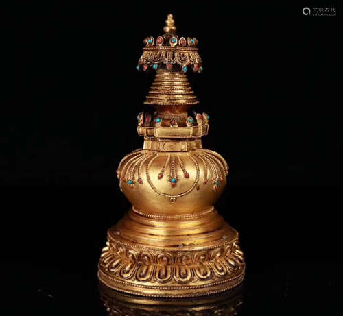 A TIBETAN GILT- BRONZE RITUAL TOWER