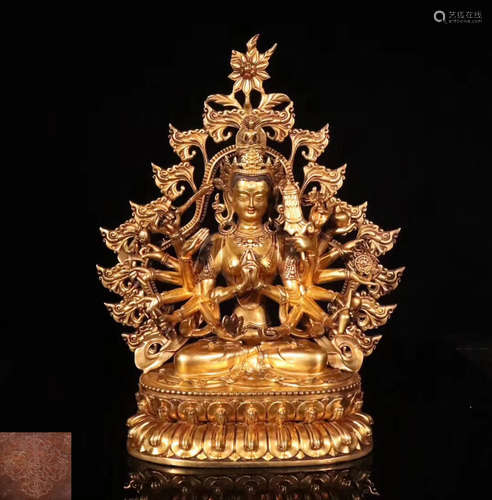 A GILT BRONZE THOUSANDS-HANDS GUANYIN STATUE