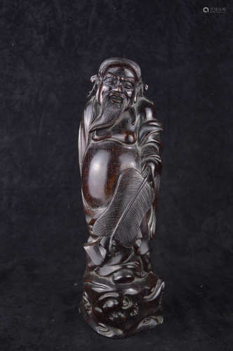 A TAOIST ZHONG IMMORTAL SHAPED WOOD CARVING