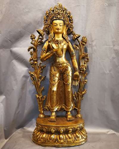 A BRONZE GILT GREEN DEGREE BUDDHA