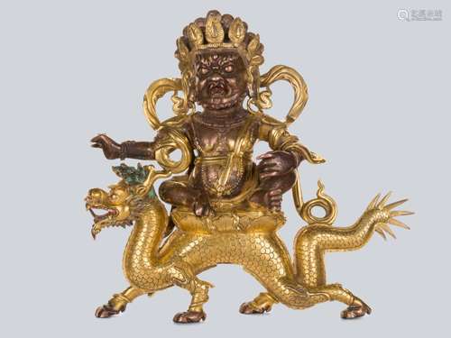 A Gilt Bronze Figure of White Jambhala, China, 18th Century.