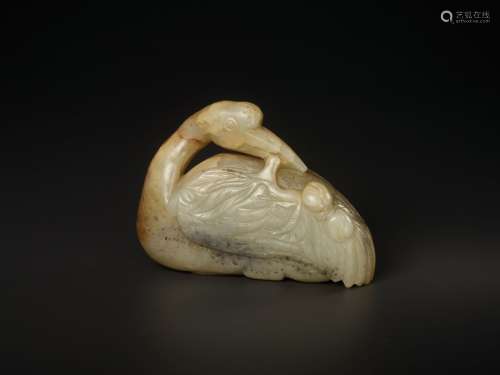 Chinese Works of ArtA CELADON AND RUSSET JADE '...