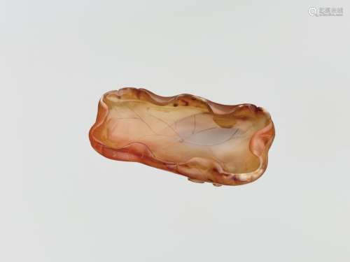 Chinese Works of ArtA CARVED AGATE ‘LOTUS’ WASH...