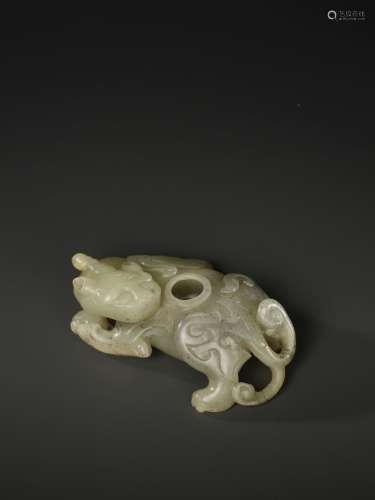 Chinese Works of ArtA FINELY CARVED JADE BIXIE ...