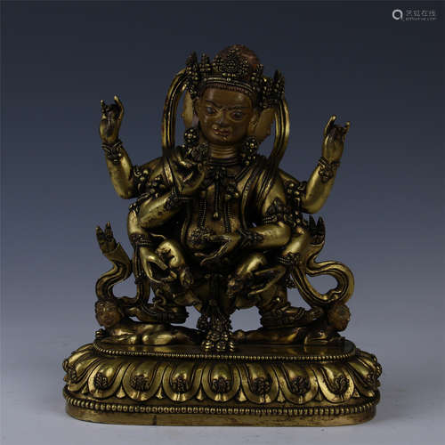 TIBETAN GILT BRONZE SEATED SIX ARM GOD OF WEALTH