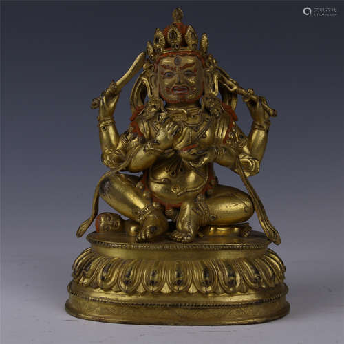 TIBETAN GILT BRONZE SEATED FOUR ARM ARYAACALANATHA BUDDHA