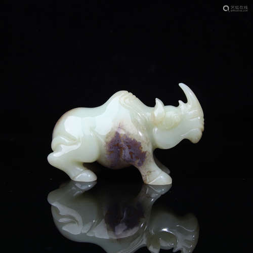 AN ANCIENT  JADE RHINOCEROS ORNAMENT