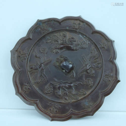 7-9TH CENTURY, A SUNFLOWER DESIGN MIRROR, TANG DYNASTY