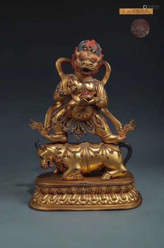 A YAMA BUDDHA DESIGN GILT BRONZE FIGURE