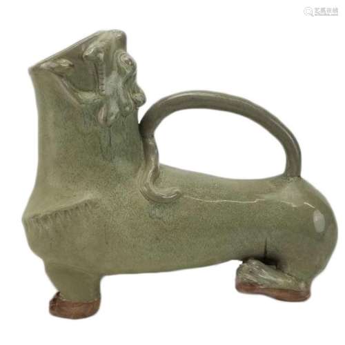 A celadon glazed animal motif pitcher with a wide open