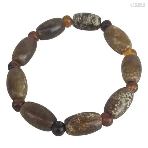 An Oval Jade Amber Bracelet