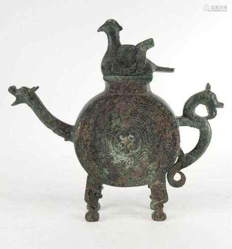 An Archaic Bronze Ritual Wine Vessel