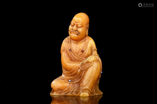 TIANHUANG SOAPSTONE CARVED 'ARHAT' FIGURE