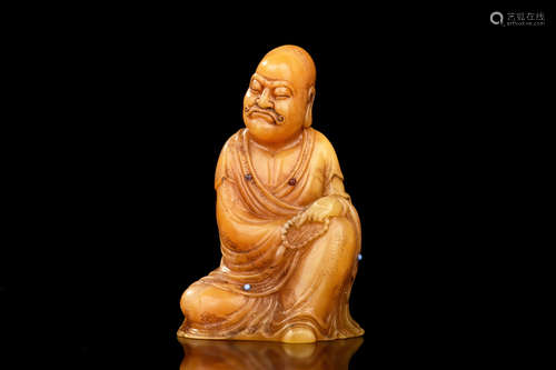 TIANHUANG SOAPSTONE CARVED 'ARHAT' FIGURE