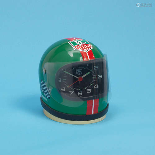 Formula 1 Green, Ref: 44905, Circa 1980  TAG Heuer. A miniature racing helmet desk clock with alarm