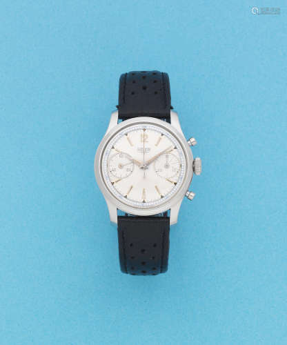Pre-Carrera, Ref: 404, Circa 1950  Heuer. A stainless steel manual wind chronograph wristwatch