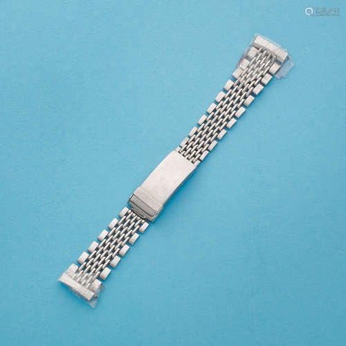 Circa 1970  A stainless steel Heuer Gay Frères 'rice link' bracelet with end links