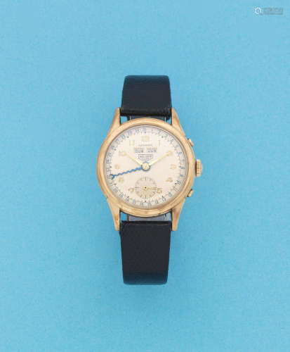 Circa 1950  Heuer. A gold plated bumper automatic triple calendar wristwatch