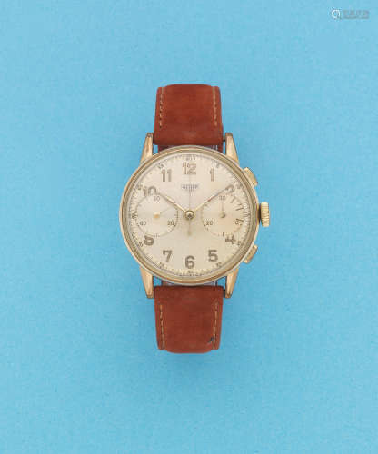 Circa 1945  Heuer. A gold plated and stainless steel manual wind chronograph wristwatch