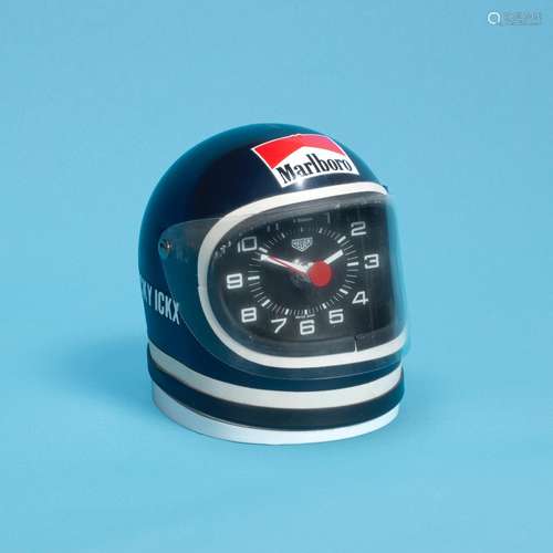 Jacky Ickx Marlboro, Ref: 42930, Circa 1975  Heuer. A miniature 'Cavallino' racing helmet desk clock