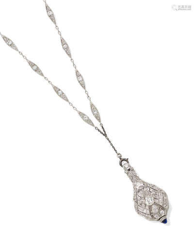 A diamond and platinum pendant watch with chain