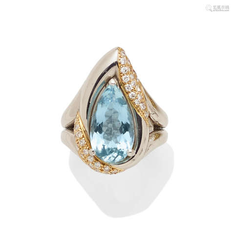 An aquamarine, diamond, 18k gold and platinum ring