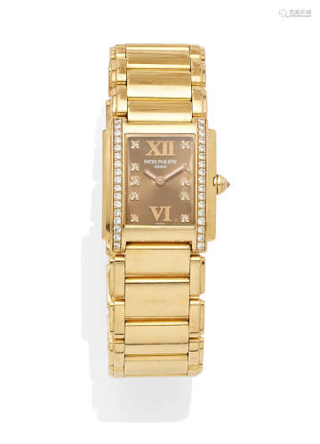with certificate of origin and leather folder; A lady's diamond 18K rose gold Twenty-4 bracelet wristwatch, Patek Philippe