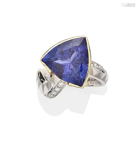 A tanzanite, diamond, 18k gold and platinum ring