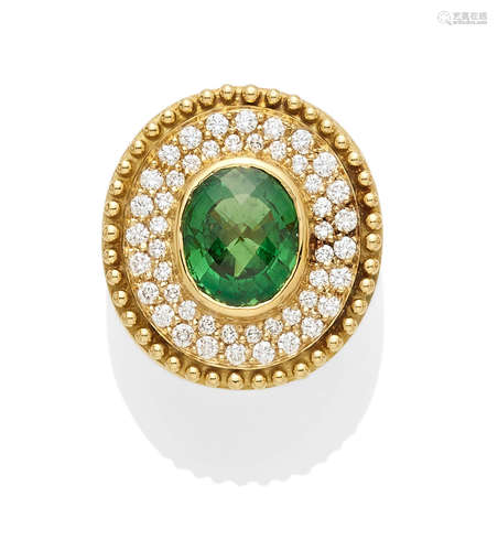 A tsavorite garnet, diamond and 18k gold ring