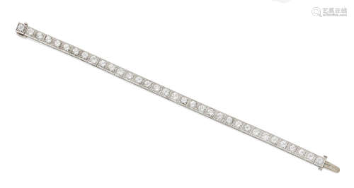 A diamond and platinum line bracelet