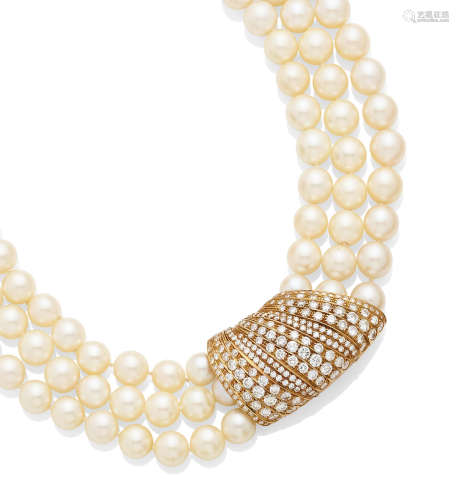 A three strand Cultured Pearl, Diamond and Gold Necklace