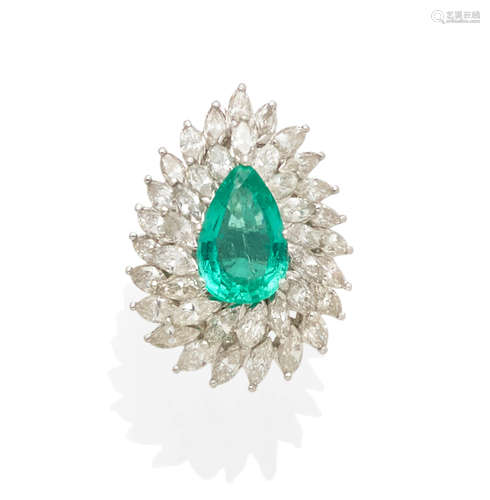 An emerald, diamond and platinum ring/pendant