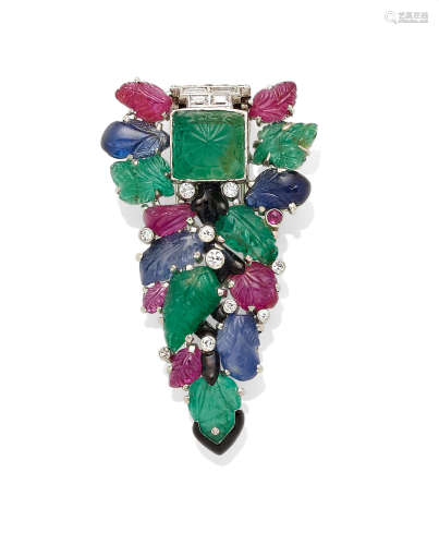 An emerald, sapphire, ruby, diamond and platinum clip