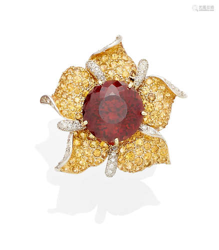 A garnet, yellow sapphire, diamond and gold flower ring