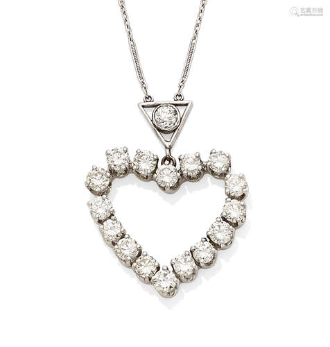 A diamond and white gold heart pendant on a platinum chain