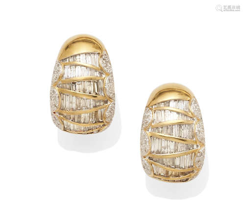 A pair of Diamond and 14k bi-color Gold Ear Clips