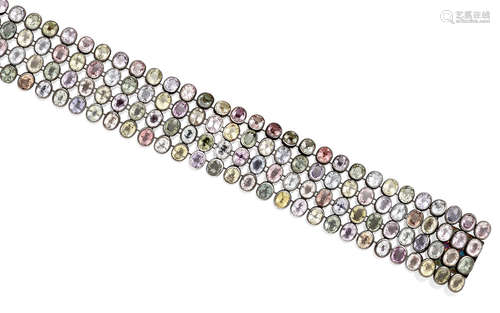 A multi-colored sapphire and blackened 18k gold bracelet