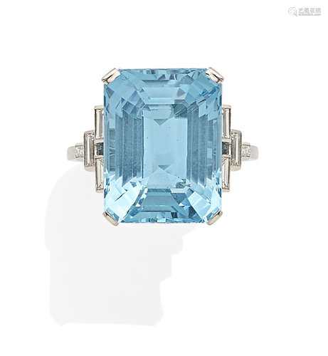 An aquamarine, diamond and platinum ring