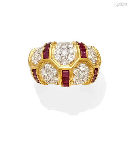 A ruby, diamond and bi-color gold ring