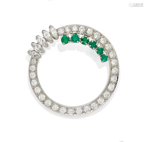 A Diamond, Emerald and Platinum Circle Brooch