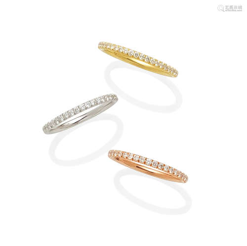 A set of three diamond and 18k yellow, white and rose gold bands