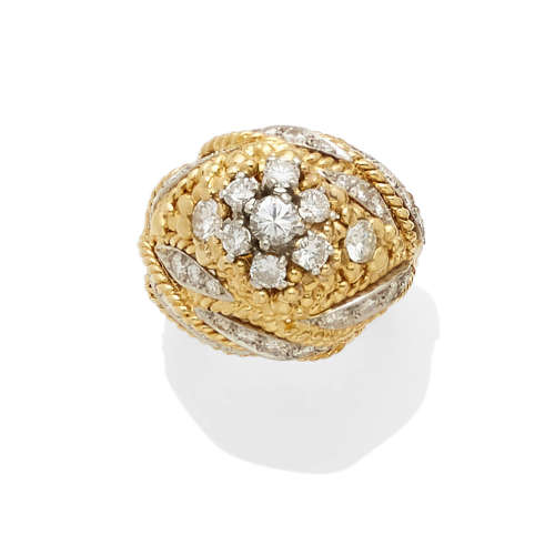 A diamond and gold dome ring
