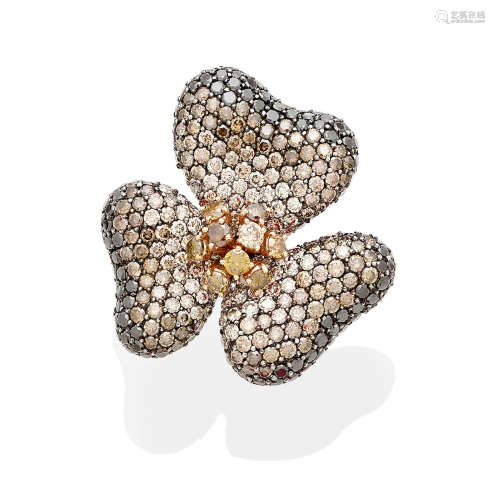 A colored diamond and 18k gold flower ring