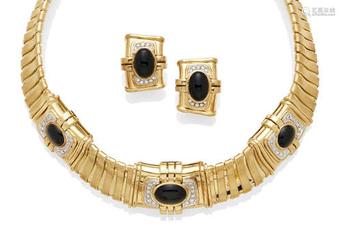 A diamond, black onyx and 18K gold collar and ear clip set