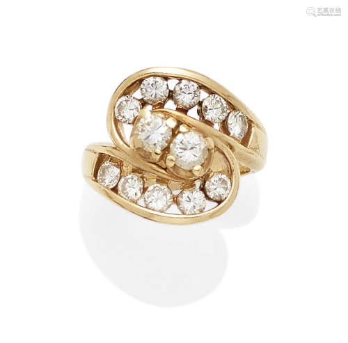 A diamond and 14k gold ring