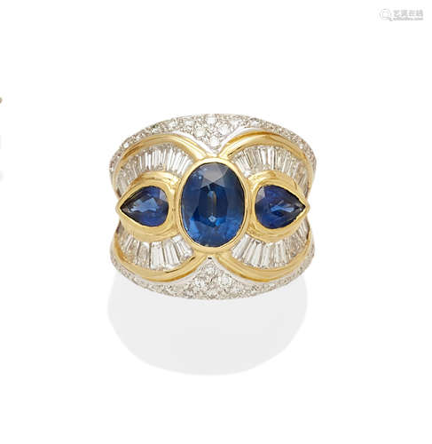 A sapphire, diamond and 18k bi-color gold ring