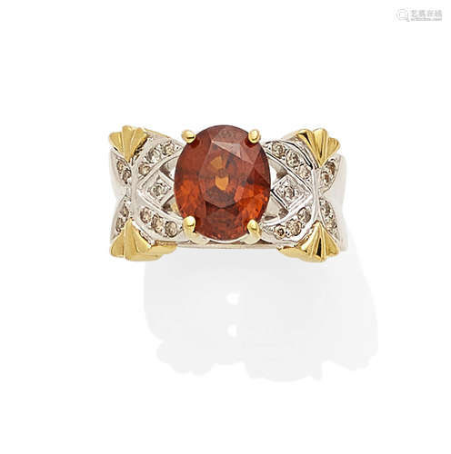 A zircon, colored diamond and bi-color gold ring