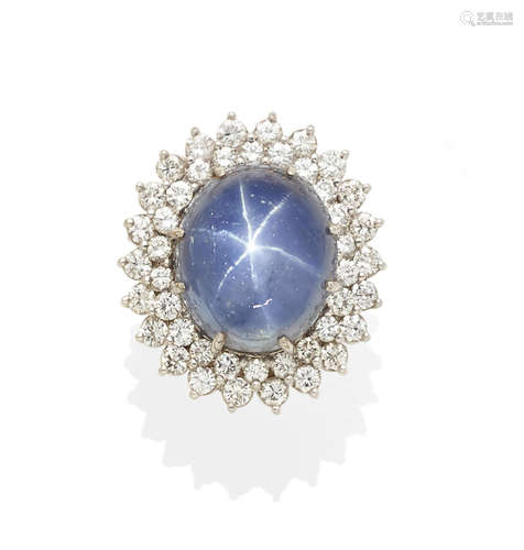 A star sapphire, diamond and 14K white gold ring