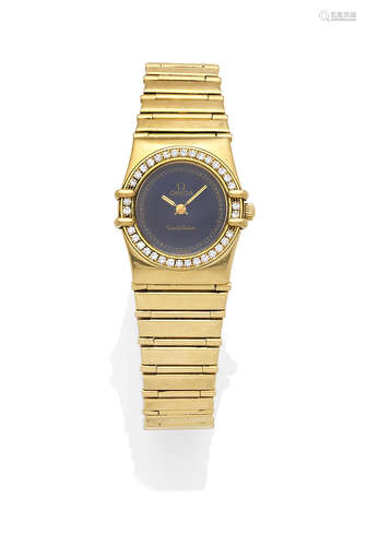 A diamond, black onyx and 18k gold lady's 'Constellation' wristwatch, Omega